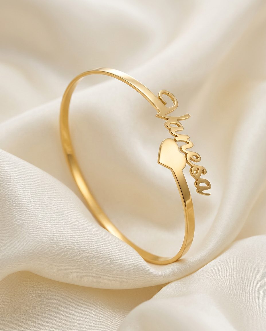 Bin Maqsood Vanesa personalised name bangle with heart detail.