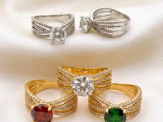 Rings — Bin Maqsood artificial rings with clear, ruby, and emerald-style stones.